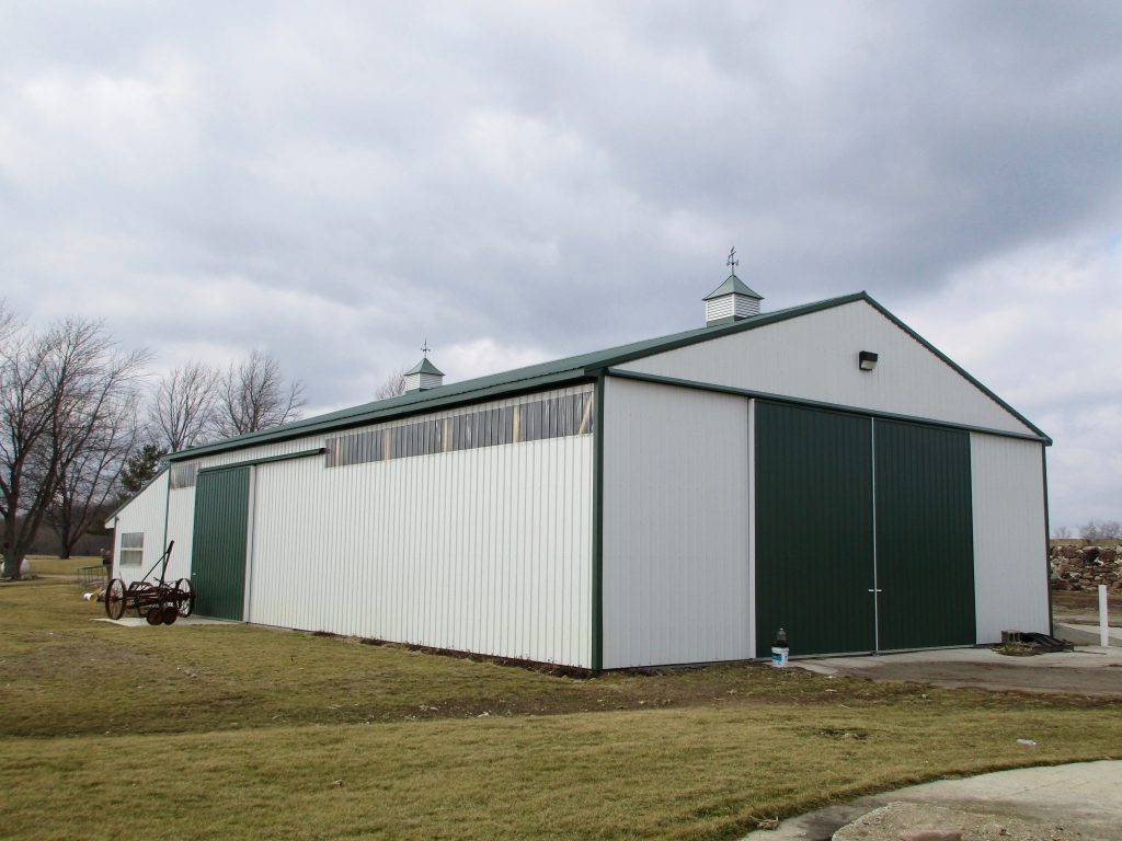 Bob & Kay - Leesburg, IN 48 x 72 x 16 Farm Building. Hunter Green roof and trim with White sides.