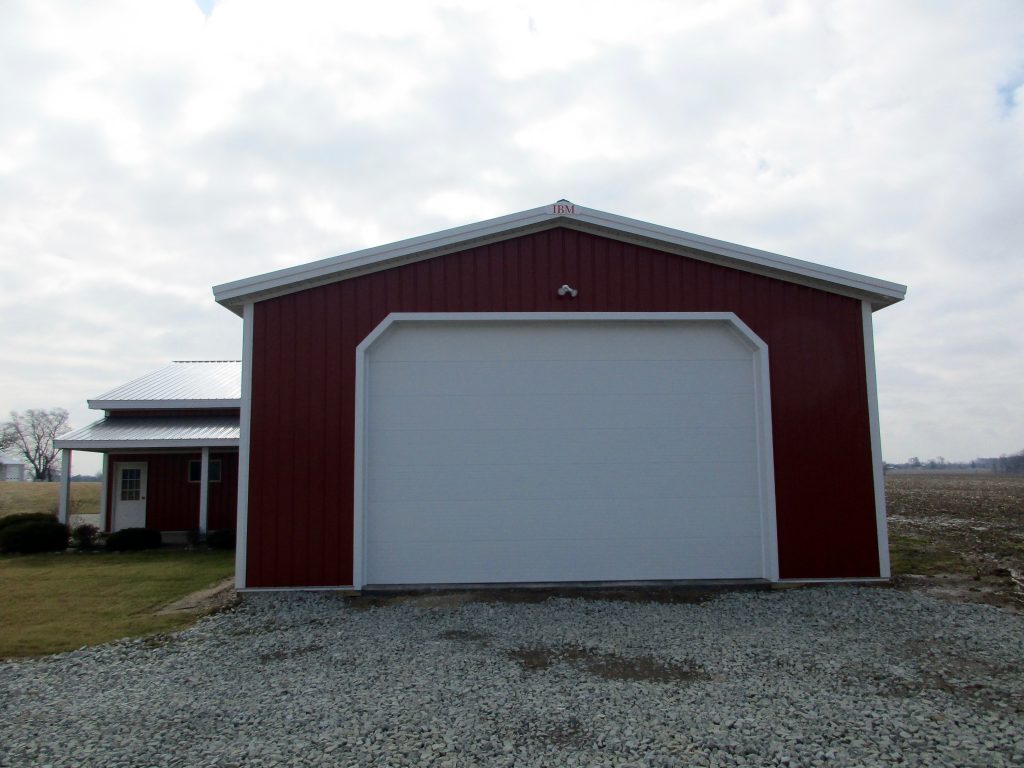 Brian - Nappanee, IN 15 x 56 x 9 lean to in the back. Charcoal roof. Rustic Red sides. White trim.