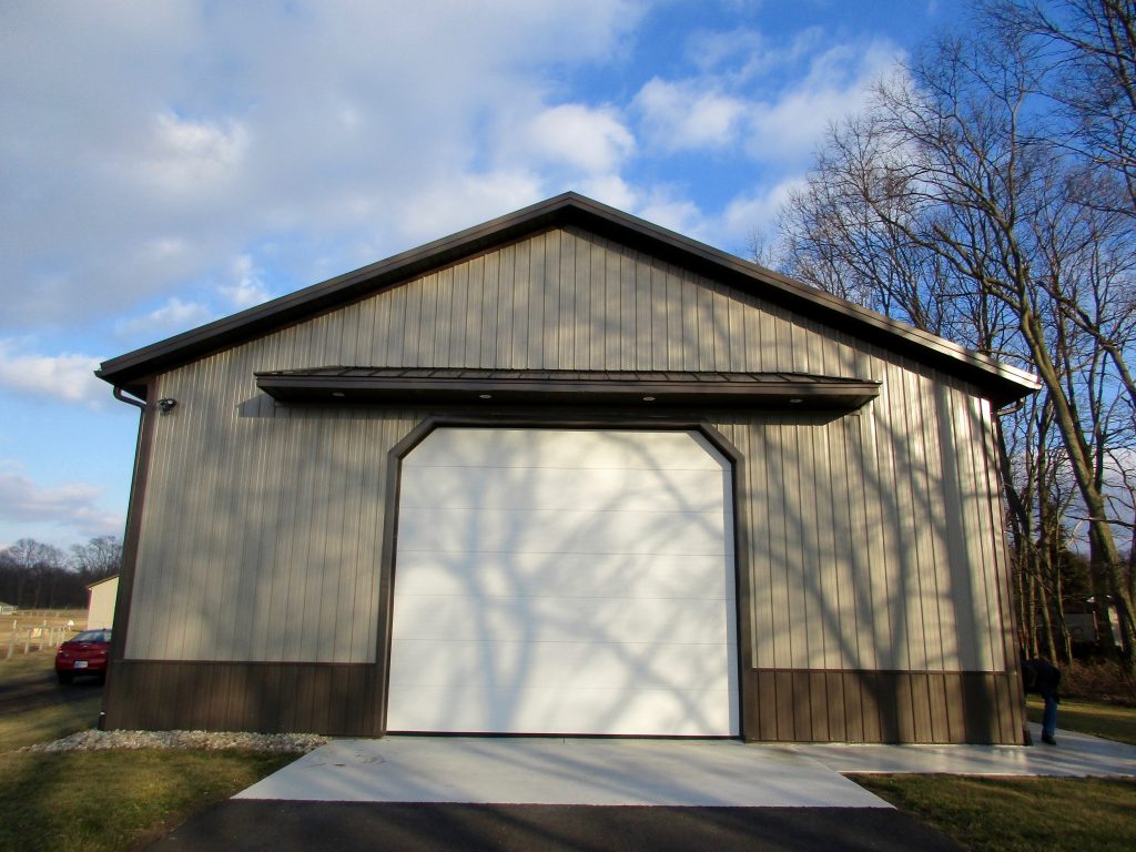 Gregg - New Paris, IN 40 x 96 x 16 with 20 x 20 x 10 office. Standing Seam roof. Charcoal roof, trim with Taupe sides.