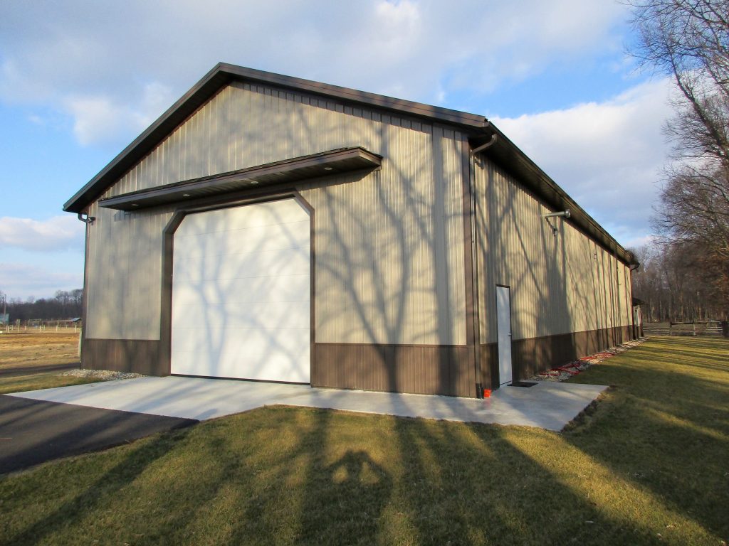 Gregg - New Paris, IN 40 x 96 x 16 with 20 x 20 x 10 office. Standing Seam roof. Charcoal roof, trim with Taupe sides.