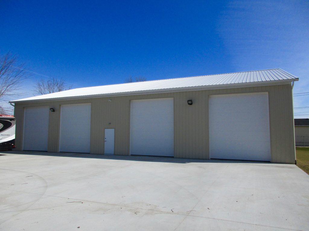 Lantz Builders - Elkhart, IN 60 x 80 x 15.5 Commercial Building. White roof, and trim with Light Stone sides.