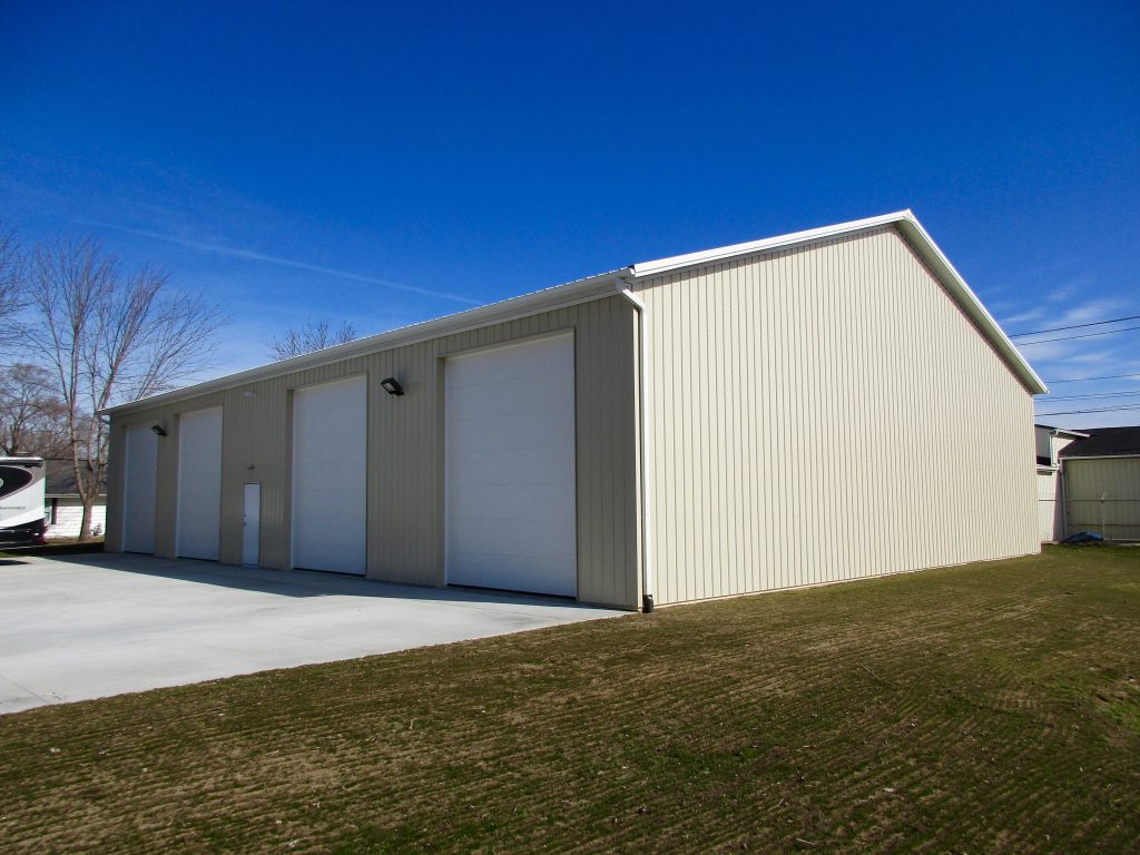 Lantz Builders - Elkhart, IN 60 x 80 x 15.5 Commercial Building. White roof, and trim with Light Stone sides.