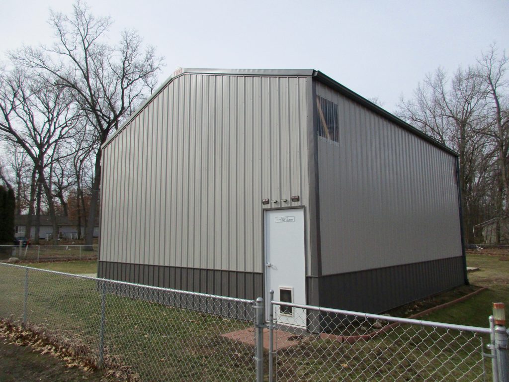 Warren - Middleburg, IN 26 x 30 x 14 storage building. Charcoal roof, trim, and wainscoting with Gray sides.