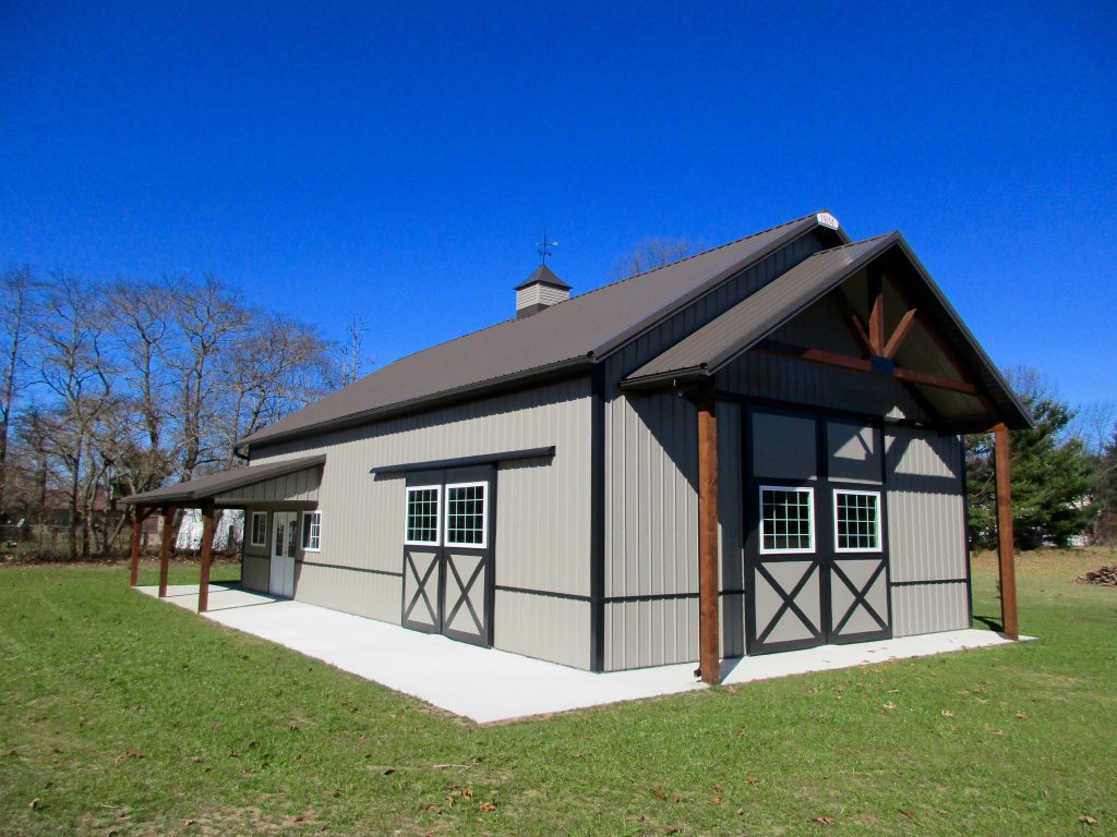 Chuck, Osceola, IN - 30x52x13 with a porch in front and a wrap around porch in the back. Burnished Slate roof and Taupe sides.