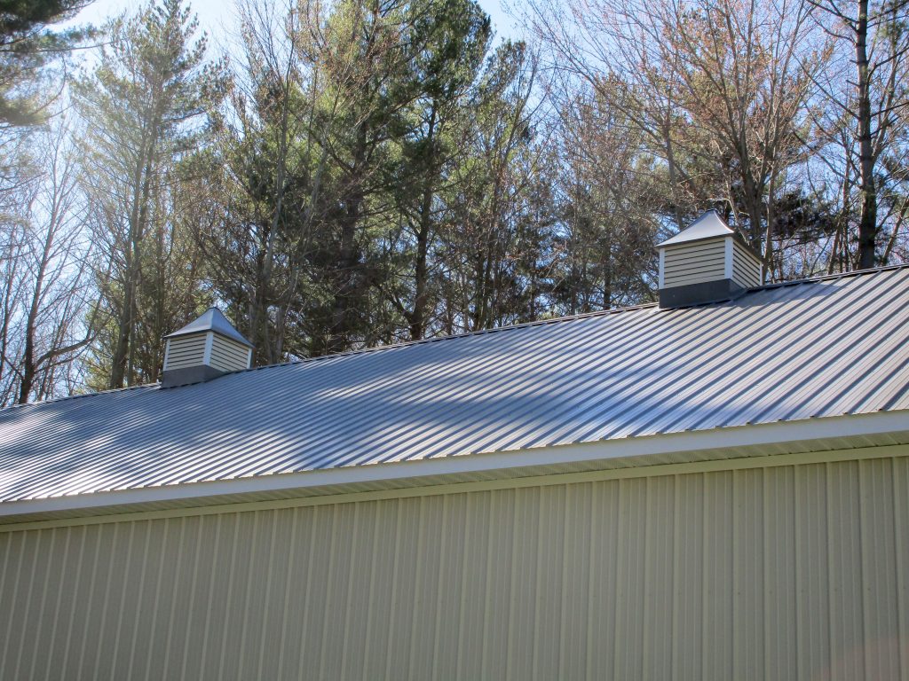 Dan-Harbert,MI 36x56x14 Charcoal roof and Light Stone sides.