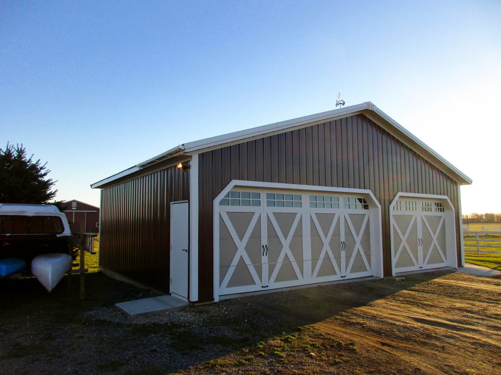 Larry-Wakarusa, IN 36x28x10 White roof & trim, and Brown sides.